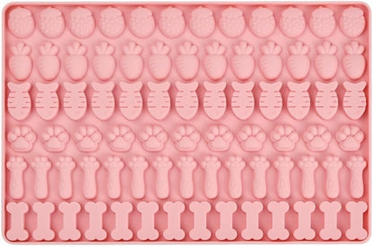 Rosa Leckerli Förmchen mit Fischen, Ananas, Pfoten, Knochen und Karotten