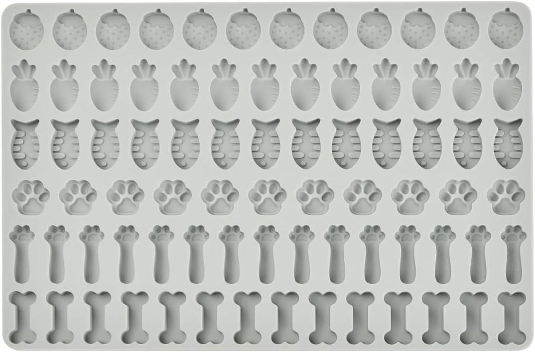 Graue Leckerli Förmchen mit Fischen, Ananas, Pfoten, Knochen und Karotten